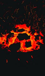 Preview wallpaper bonfire, sparks, coals, heat, dark