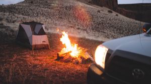 Preview wallpaper bonfire, tent, car, hill