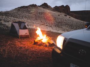 Preview wallpaper bonfire, tent, car, hill