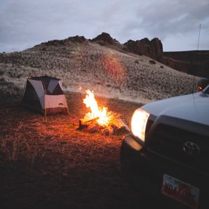 Preview wallpaper bonfire, tent, car, hill