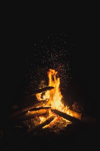 Preview wallpaper bonfire, wood, fire, flame, sparks