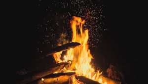 Preview wallpaper bonfire, wood, fire, flame, sparks