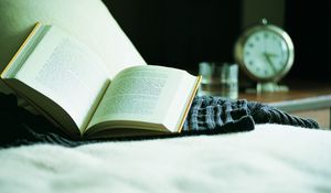 Preview wallpaper book, bed, alarm clock, reading