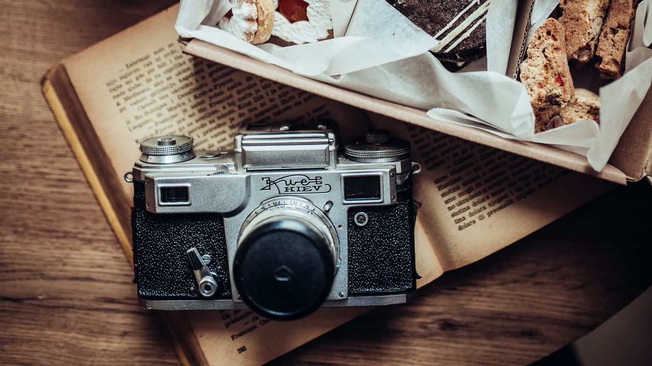 Wallpaper book, camera, cookies, table, retro