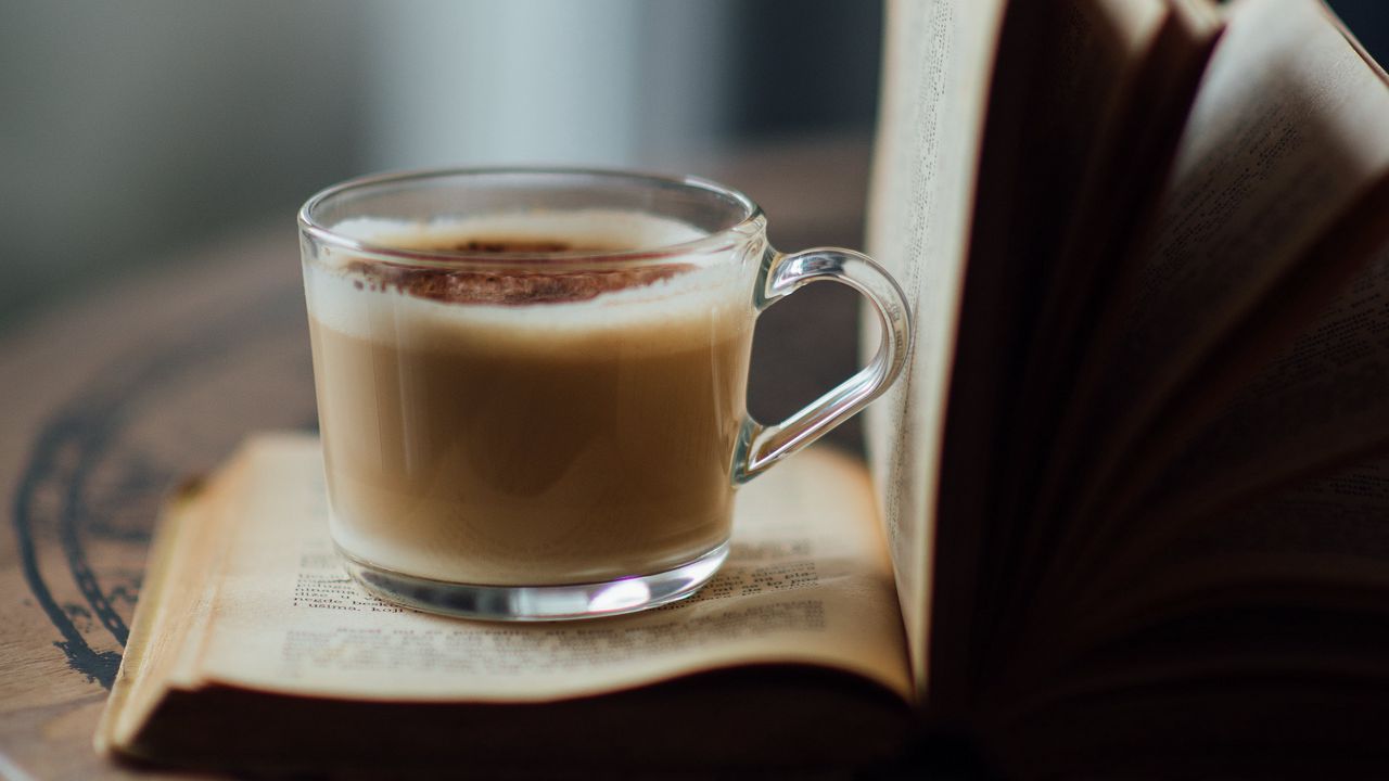 Wallpaper book, cup, coffee