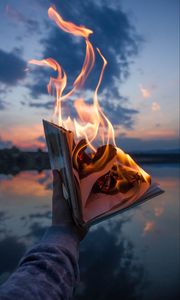 Preview wallpaper book, fire, hand, flame, dusk