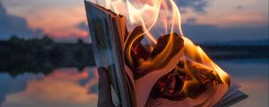 Preview wallpaper book, fire, hand, flame, dusk