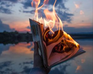 Preview wallpaper book, fire, hand, flame, dusk