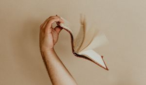 Preview wallpaper book, hand, pages, beige