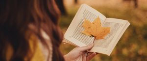 Preview wallpaper book, leaf, hand, autumn, blur