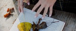 Preview wallpaper book, leaves, hands, autumn, aesthetics