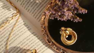 Preview wallpaper book, mirror, flowers, earrings, gold, aesthetics