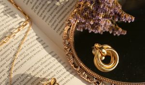 Preview wallpaper book, mirror, flowers, earrings, gold, aesthetics