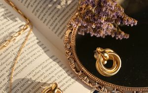 Preview wallpaper book, mirror, flowers, earrings, gold, aesthetics