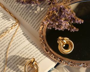 Preview wallpaper book, mirror, flowers, earrings, gold, aesthetics