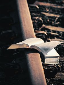Preview wallpaper book, reading, rails, railroad, aesthetics