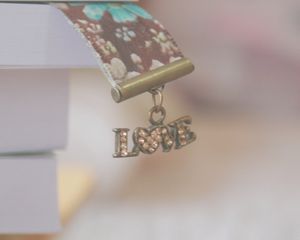Preview wallpaper bookmark, book, sign, keychain