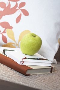 Preview wallpaper books, apple, pillows, blurring