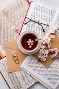 Preview wallpaper books, cup, flowers, glasses, rings