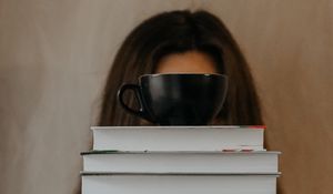 Preview wallpaper books, cup, girl, hands