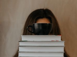 Preview wallpaper books, cup, girl, hands