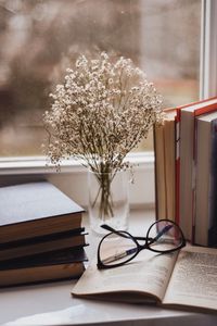 Preview wallpaper books, glasses, vase, window, window sill, flowers