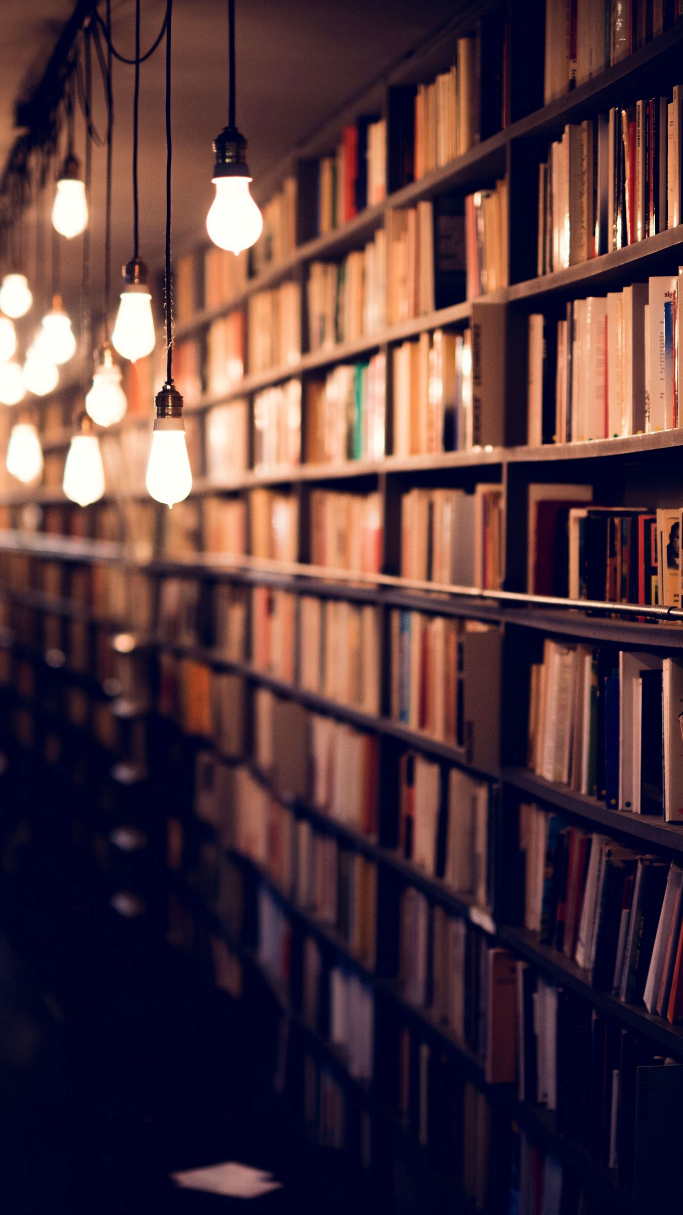 Download wallpaper 1350x2400 books library shelves lighting iphone  876s6 for parallax hd background