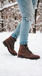 Preview wallpaper boots, legs, snow, jeans