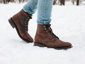 Preview wallpaper boots, legs, snow, jeans