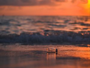 Preview wallpaper bottle, glass, sea, sunset, shore, blur
