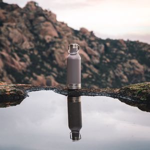 Preview wallpaper bottle, puddle, water, reflection