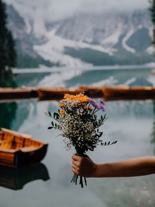 Preview wallpaper bouquet, flowers, hand, focus