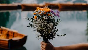 Preview wallpaper bouquet, flowers, hand, focus