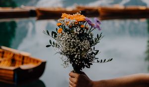 Preview wallpaper bouquet, flowers, hand, focus