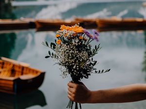 Preview wallpaper bouquet, flowers, hand, focus