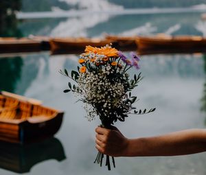 Preview wallpaper bouquet, flowers, hand, focus