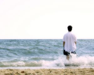 Preview wallpaper boy, beach, sea, foam, harmony, meditation