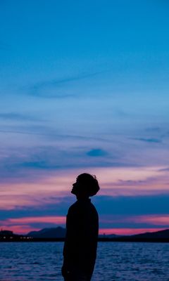 240x400 Wallpaper boy, silhouette, sunset, sky, sea