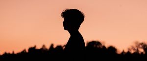 Preview wallpaper boy, silhouette, sunset, loneliness, water