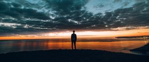 Preview wallpaper boy, sunset, horizon, sea