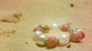 Preview wallpaper bracelet, jewelry, sand, light