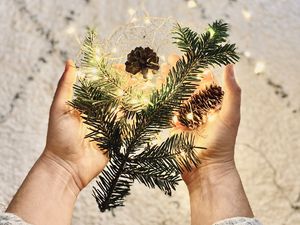 Preview wallpaper branch, garland, cones, hands, holiday, new year, christmas