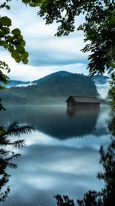 Preview wallpaper branches, lake, house, mountains, reflection