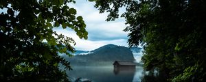Preview wallpaper branches, lake, house, mountains, reflection