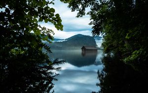 Preview wallpaper branches, lake, house, mountains, reflection