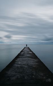 Preview wallpaper breakwater, pier, man, sea, loneliness