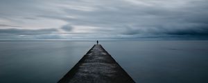 Preview wallpaper breakwater, pier, man, sea, loneliness