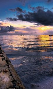 Preview wallpaper breakwater, stone, protected, evening, sea, clouds, shadows, calm