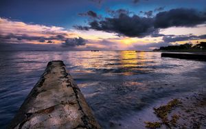 Preview wallpaper breakwater, stone, protected, evening, sea, clouds, shadows, calm