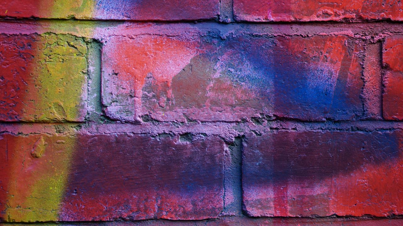 Wallpaper brick wall, multicolored, texture